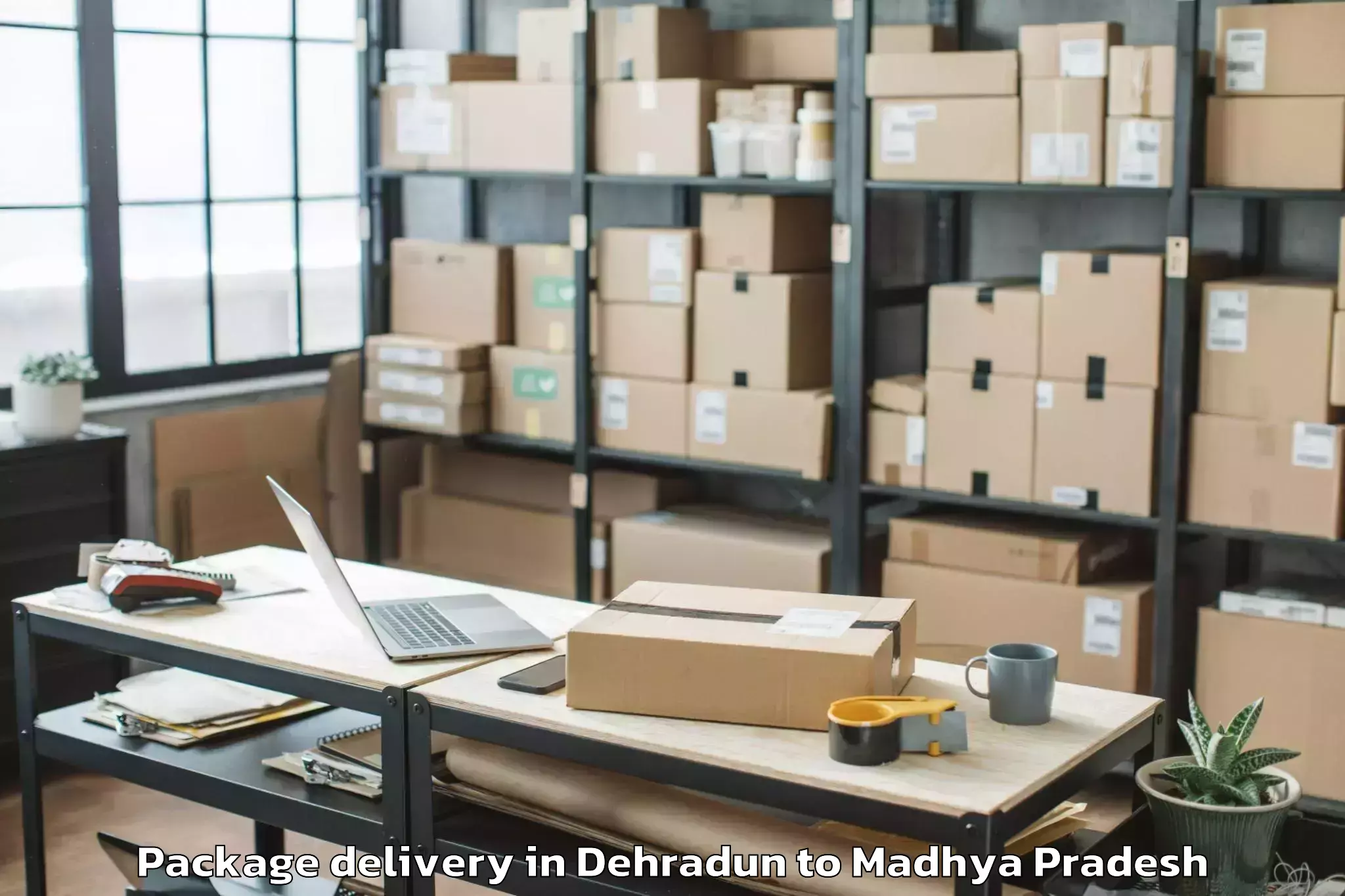 Trusted Dehradun to Lahar Package Delivery